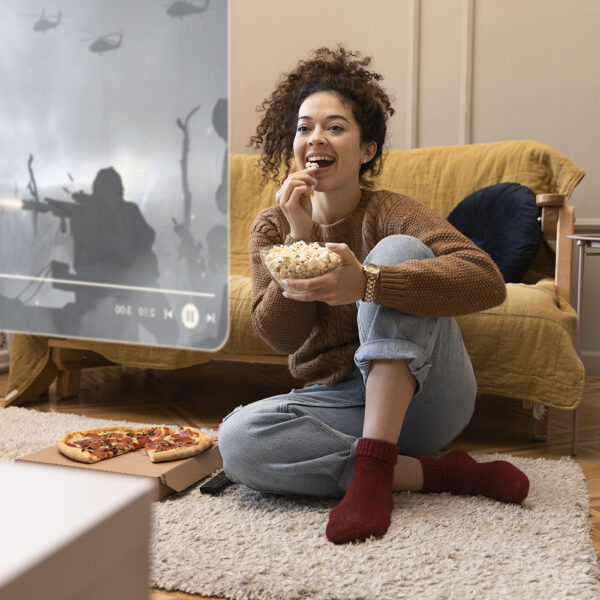 full-shot-woman-looking-floating-screen