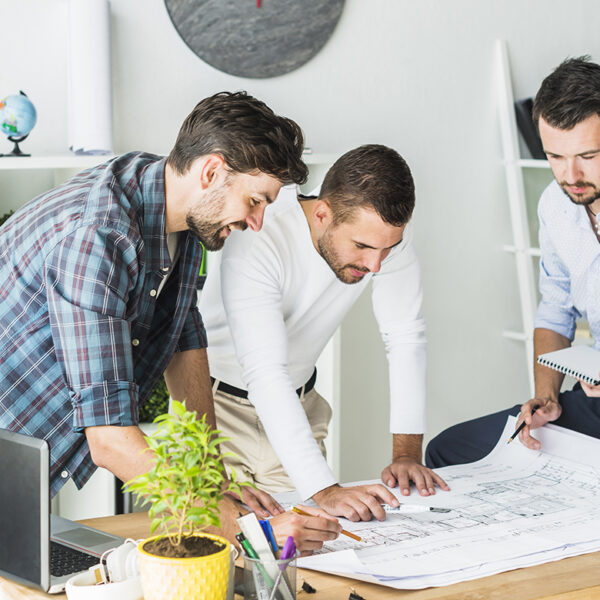 group-male-architect-preparing-blueprint-office