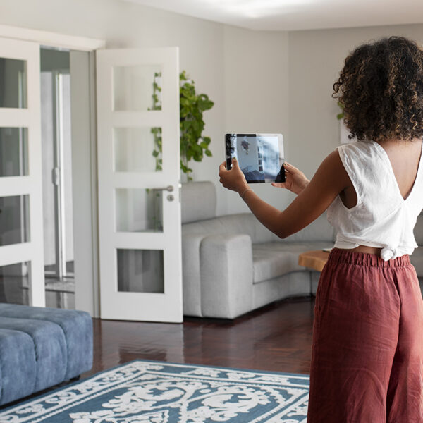 person-doing-house-tour-online